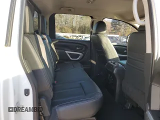 2018 Nissan Titan Pro-4X z VIN 1N6AA1E58JN520184, wystawiony jako Copart lot #88111315 z przebiegiem 93 326 mil mil oraz Szkoda całkowita • Salvage title. Historia ofert i sprzedaży dostępna na DreamBid. Obrazek 10.