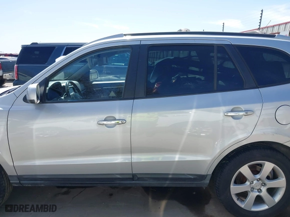 2009 Hyundai Santa Fe SE with VIN 5NMSH13E99H300552, listed as a IAAI auction lot 41772584 with 155,127 mi miles. Bid and sale history available at carsss.com. Image 15.