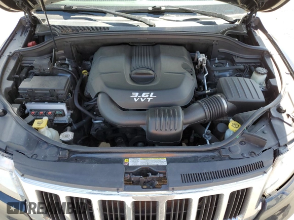 2013 Jeep Grand Cherokee Laredo с VIN 1C4RJFAG7DC645932, выставлен на аукционе Copart как лот 57969715 с пробегом 165 717 миль миль и Списание • Salvage title. История ставок и продаж доступна на DreamBid. Изображение 12.
