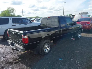 2002 Ford Ranger XLT Appearance with VIN 1FTYR44E72PA64505, listed as a IAAI auction lot 42048059 with 382,344 mi miles. Bid and sale history available at carsss.com. Image 4.