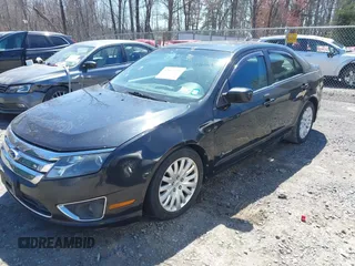 2010 Ford Fusion Hybrid with VIN 3FADP0L33AR294150, listed as a IAAI auction lot 42057023 with 197,497 mi miles. Bid and sale history available at carsss.com. Image 2.