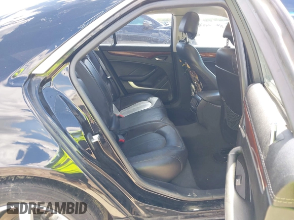 2008 Cadillac CTS RWD z VIN 1G6DJ577080174096, wystawiony jako IAAI lot #42237070 z przebiegiem 139 776 mil mil oraz . Historia ofert i sprzedaży dostępna na DreamBid. Obrazek 8.