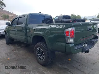 2021 Toyota Tacoma 4WD SR5 with VIN 3TMDZ5BN0MM116198, listed as a IAAI auction lot 41445815 with 59,561 mi miles. Bid and sale history available at carsss.com. Image 3.