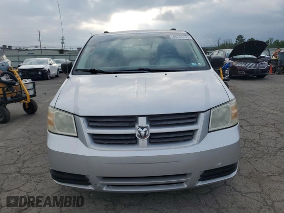2009 Dodge Grand Caravan SE z VIN 2D8HN44E29R591969, wystawiony jako Copart lot #64255535 z przebiegiem 154 214 mil mil oraz Szkoda całkowita • Salvage title. Historia ofert i sprzedaży dostępna na DreamBid. Obrazek 5.