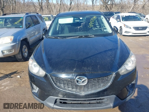 2014 Mazda CX-5 Sport with VIN JM3KE2BE7E0313978, listed as a IAAI auction lot 41437144 with 161,181 mi miles and . Bid and sale history available at carsss.com. Image 12.