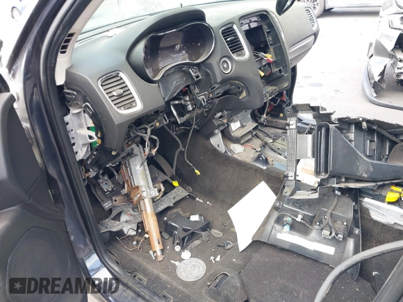 2015 Dodge Durango SXT with VIN 1C4RDHAG4FC113821, listed as a IAAI auction lot 42338999 with Not provided miles and . Bid and sale history available at DreamBid. Image 6.