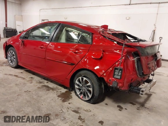 2021 Toyota Prius L Eco z VIN JTDKAMFU1M3143311, wystawiony jako IAAI lot #41961005 z przebiegiem 42 275 mil mil oraz . Historia ofert i sprzedaży dostępna na DreamBid. Obrazek 3.