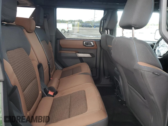 2023 Ford Bronco z VIN 1FMEE5BP1PLB18612, wystawiony jako Copart lot #53937575 z przebiegiem 28 536 mil mil oraz Szkoda całkowita • Salvage title. Historia ofert i sprzedaży dostępna na DreamBid. Obrazek 11.