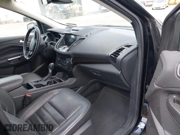2018 Ford Escape Titanium z VIN 1FMCU9J9XJUB66275, wystawiony jako IAAI lot #42757952 z przebiegiem 97 629 mil mil oraz . Historia ofert i sprzedaży dostępna na DreamBid. Obrazek 5.