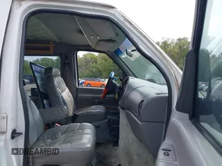 1999 Ford Econoline Cargo with VIN 1FDRE14WXXHB72976, listed as a IAAI auction lot 37688871 with 135,319 mi miles. Bid and sale history available at carsss.com. Image 5.