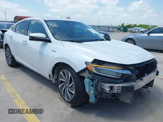 2019 Honda Insight Touring with VIN 19XZE4F95KE013732, listed as a IAAI auction lot 42510469 with 293,118 mi miles and . Bid and sale history available at DreamBid. Image 1.