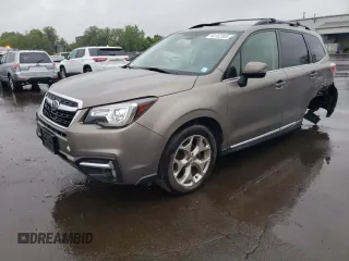 2018 Subaru Forester Touring z VIN JF2SJAWC9JH549911, wystawiony jako Copart lot #58152385 z przebiegiem 91 787 mil mil oraz Szkoda całkowita • Salvage title. Historia ofert i sprzedaży dostępna na DreamBid. Obrazek 1.