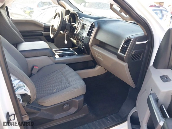 2015 Ford F-150 XLT w/HD Payload Pkg with VIN 1FTFW1EG7FFB09470, listed as a IAAI auction lot 41455246 with 152,766 mi miles. Bid and sale history available at carsss.com. Image 5.