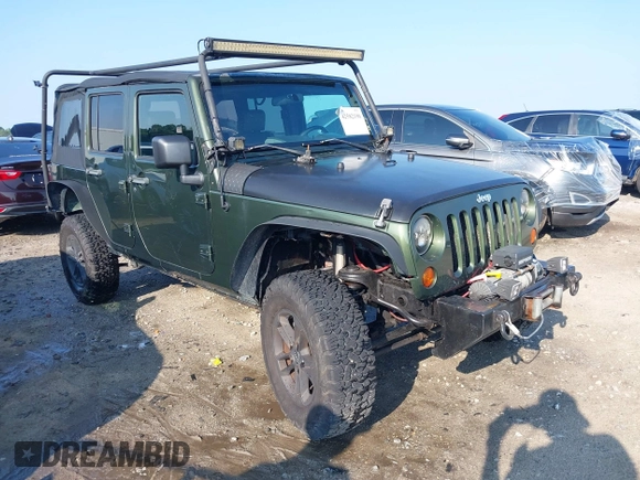 2007 Jeep Wrangler Unlimited X с VIN 1J4GA39197L115109, выставлен на аукционе IAAI как лот 42582190 с пробегом 141 080 миль миль и . История ставок и продаж доступна на DreamBid. Изображение 1.