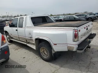 1989 GMC Sierra 1500 with VIN 2GTHC39K3K1532298, listed as a Copart auction lot 51497065 with 233,797 mi miles and Salvage Title. Bid and sale history available at DreamBid. Image 2.