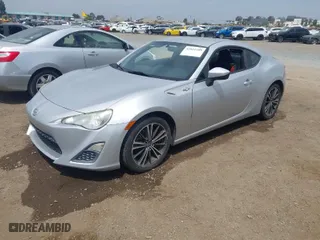 2013 Scion FR-S with VIN JF1ZNAA14D2714039, listed as a IAAI auction lot 42041189 with 167,685 mi miles. Bid and sale history available at carsss.com. Image 2.
