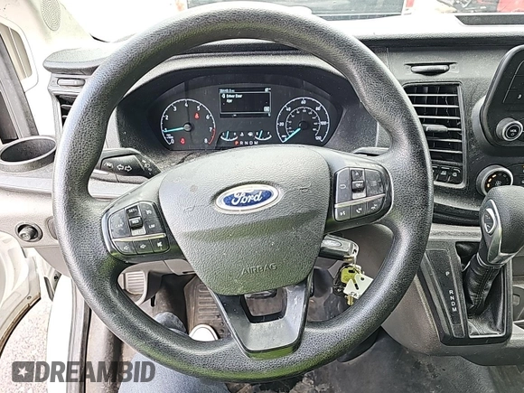 2021 Ford Transit Cargo with VIN 1FTBR1Y82MKA76523, listed as a IAAI auction lot 42679221 with 39,449 mi miles and . Bid and sale history available at DreamBid. Image 9.
