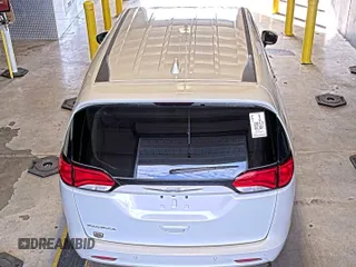 2017 Chrysler Pacifica Touring with VIN 2C4RC1DG5HR764942, listed as a IAAI auction lot 42255421 with 64,381 mi miles and . Bid and sale history available at DreamBid. Image 11.