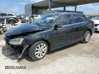 2014 Volkswagen Jetta SE with VIN 3VWD07AJ7EM293656, listed as a Copart auction lot 55077455 with 82,160 mi miles and Salvage title. Bid and sale history available at DreamBid. Image 1.