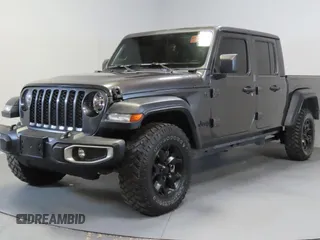 2023 Jeep Gladiator Freedom with VIN 1C6JJTAG9PL557861, listed as a Copart auction lot 56429485 with 44,716 mi miles and Salvage title. Bid and sale history available at DreamBid. Image 2.