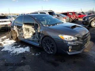 2021 Subaru WRX Premium z VIN JF1VA1C66M9816534, wystawiony jako Copart lot #82904164 z przebiegiem 145 165 mil mil oraz Szkoda całkowita • Salvage title. Historia ofert i sprzedaży dostępna na DreamBid. Obrazek 4.