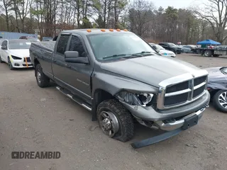 2005 Dodge 2500 SLT with VIN 3D7KS28C55G839793, listed as a IAAI auction lot 41015130 with 245,409 mi miles and . Bid and sale history available at DreamBid. Image 1.