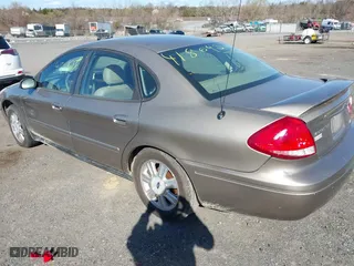2005 Ford Taurus SEL with VIN 1FAFP56S05A158275, listed as a IAAI auction lot 41869232 with 136,477 mi miles. Bid and sale history available at carsss.com. Image 3.