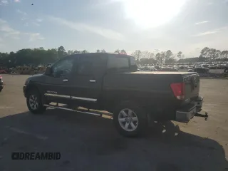2010 Nissan Titan LE with VIN 1N6BA0EC6AN320790, listed as a Copart auction lot 52613495 with 224,118 mi miles and Salvage Title. Bid and sale history available at carsss.com. Image 2.