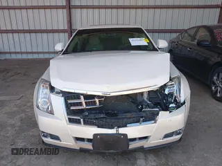 2013 Cadillac CTS Premium z VIN 1G6DS5E30D0105240, wystawiony jako IAAI lot #42145007 z przebiegiem 100 893 mil mil oraz . Historia ofert i sprzedaży dostępna na DreamBid. Obrazek 12.