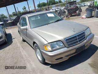 2000 Mercedes-Benz C 230/260/280/320 z VIN WDBHA29G1YA802945, wystawiony jako IAAI lot #42524661 z przebiegiem 161 227 mil mil oraz . Historia ofert i sprzedaży dostępna na DreamBid. Obrazek 1.