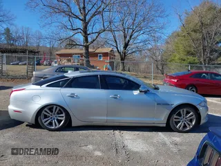 2014 Jaguar XJ z VIN SAJWJ1CD0E8V63989, wystawiony jako IAAI lot #41643513 z przebiegiem 119 924 mil mil oraz . Historia ofert i sprzedaży dostępna na DreamBid. Obrazek 13.