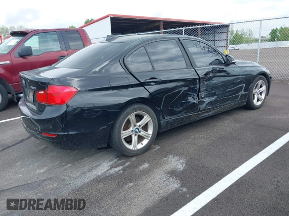 2015 BMW 3 Series 320i with VIN WBA3B1G57FNT05826, listed as a IAAI auction lot 42103193 with 128,800 mi miles. Bid and sale history available at carsss.com. Image 4.