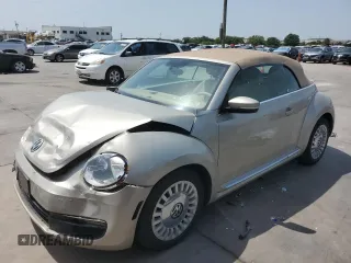 2015 Volkswagen Beetle 1.8T with VIN 3VW517AT5FM804169, listed as a Copart auction lot 65981544 with 104,754 mi miles and Salvage title. Bid and sale history available at DreamBid. Image 1.