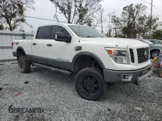 2017 Nissan Titan XD SL with VIN 1N6BA1F43HN544218, listed as a Copart auction lot 85758614 with 124,765 mi miles and Salvage Title. Bid and sale history available at carsss.com. Image 4.