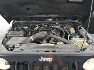 2009 Jeep Wrangler Sahara with VIN 1J4FA54109L702963, listed as a Copart auction lot 89211555 with 125,138 mi miles and Clean title. Bid and sale history available at DreamBid. Image 12.