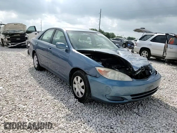 2004 Toyota Camry LE z VIN 4T1BE32K24U855206, wystawiony jako Copart lot #57270895 z przebiegiem 62 727 mil mil oraz Szkoda całkowita • Salvage title. Historia ofert i sprzedaży dostępna na DreamBid. Obrazek 14.