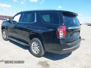 2023 Chevrolet Tahoe LS z VIN 1GNSCMKD9PR282840, wystawiony jako IAAI lot #41904280 z przebiegiem 73 298 mil mil oraz . Historia ofert i sprzedaży dostępna na DreamBid. Obrazek 3.