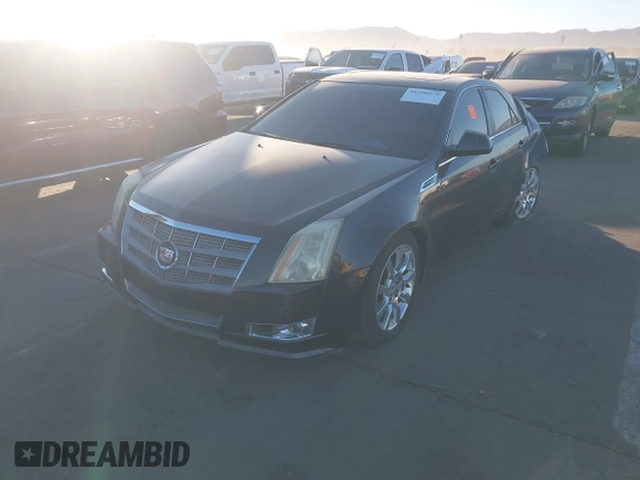 2009 Cadillac CTS RWD w/1SB with VIN 1G6DV57V190118771, listed as a IAAI auction lot 41296579 with 196,482 mi miles. Bid and sale history available at carsss.com. Image 2.