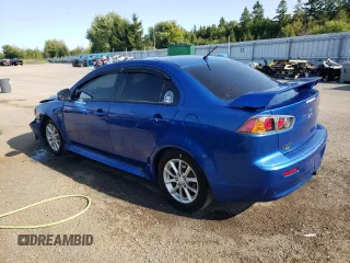 2015 Mitsubishi Lancer SE with VIN JA32V2FW3FU606202, listed as a Copart auction lot 70142394 with 129,336 mi miles and Salvage Title. Bid and sale history available at carsss.com. Image 2.