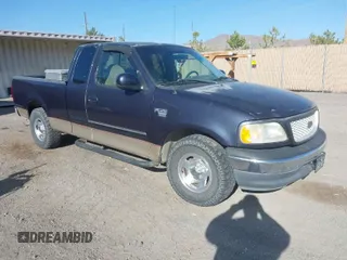 1999 Ford F-150 XL with VIN 1FTRX17L5XKB39130, listed as a IAAI auction lot 42041520 with 0 mi miles. Bid and sale history available at carsss.com. Image 1.