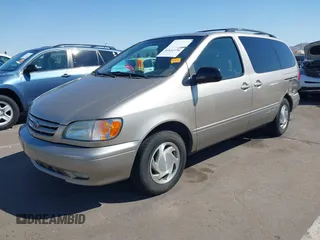 2002 Toyota Sienna LE with VIN 4T3ZF13CX2U500604, listed as a IAAI auction lot 41834778 with 139,668 mi miles. Bid and sale history available at carsss.com. Image 2.