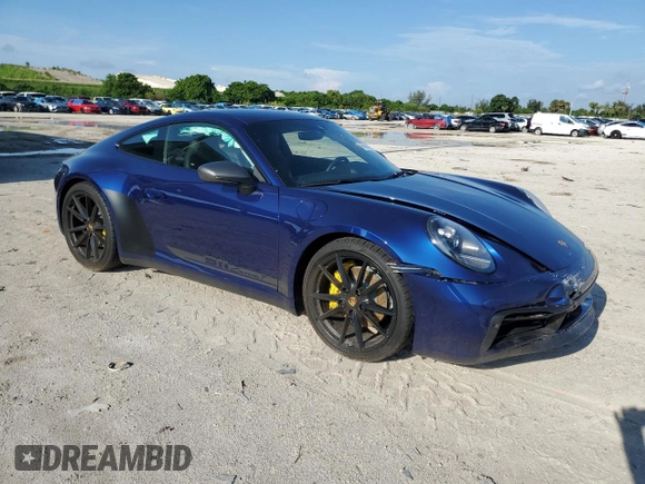 2024 Porsche 911 Carrera with VIN WP0AA2A99RS210110, listed as a Copart auction lot 68068314 with 348 mi miles and Salvage Title. Bid and sale history available at carsss.com. Image 4.
