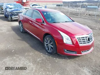 2013 Cadillac XTS with VIN 2G61N5S37D9177217, listed as a IAAI auction lot 41747566 with 140,946 mi miles. Bid and sale history available at carsss.com. Image 1.