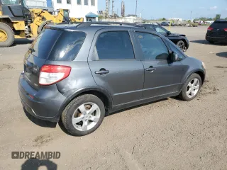 2010 Suzuki SX4 with VIN JS2YB5A24A6300249, listed as a Copart auction lot 71565394 with 291,886 mi miles and Salvage Title. Bid and sale history available at DreamBid. Image 3.