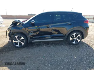 2017 Hyundai Tucson Sport z VIN KM8J33A23HU490270, wystawiony jako IAAI lot #42042967 z przebiegiem 121 660 mil mil oraz . Historia ofert i sprzedaży dostępna na DreamBid. Obrazek 14.