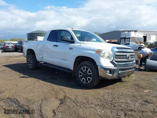 2014 Toyota Tundra 4WD Truck SR with VIN 5TFUY5F1XEX385475, listed as a IAAI auction lot 41563188 with 135,310 mi miles. Bid and sale history available at carsss.com. Image 1.