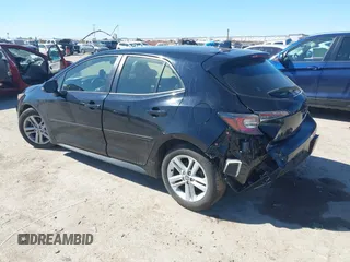 2021 Toyota Corolla SE with VIN JTND4MBE3M3144552, listed as a IAAI auction lot 41699317 with 57,309 mi miles and . Bid and sale history available at DreamBid. Image 3.