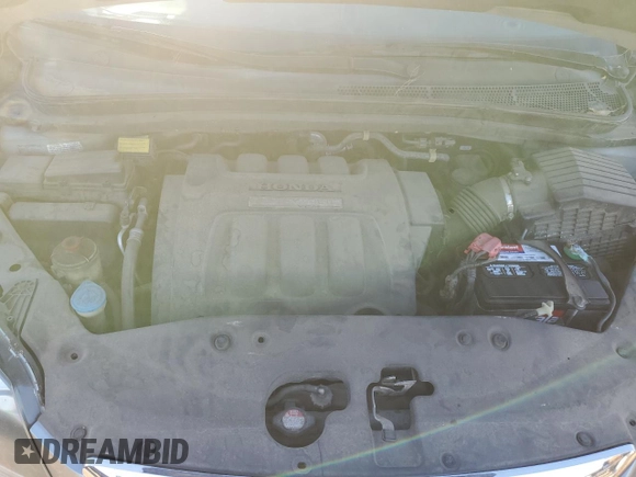 2007 Honda Odyssey Touring with VIN 5FNRL38857B044453, listed as a Copart auction lot 70323773 with 194,831 mi miles and Clean Title. Bid and sale history available at DreamBid. Image 12.