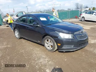 2013 Chevrolet Cruze 1LT with VIN 1G1PC5SB0D7284947, listed as a IAAI auction lot 41984587 with 215,721 mi miles and . Bid and sale history available at DreamBid. Image 1.