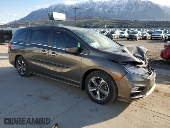 2018 Honda Odyssey Touring с VIN 5FNRL6H8XJB076145, выставлен на аукционе Copart как лот 51870865 с пробегом 96 486 миль миль и Списание • Salvage title. История ставок и продаж доступна на DreamBid. Изображение 4.